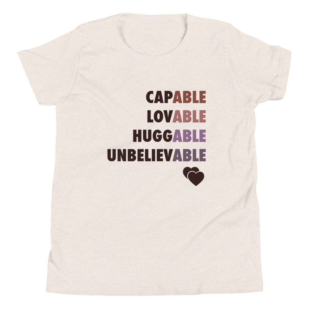 Capable, Huggable, Lovable, Unbelievable | Youth Short Sleeve Tee